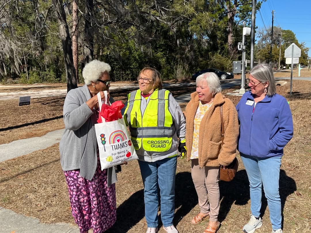 Members supporting a school crossing guard